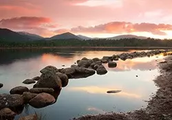 Scottish Highlands Holiday - Speyside, Cairngorms national park -sunset view over a loch